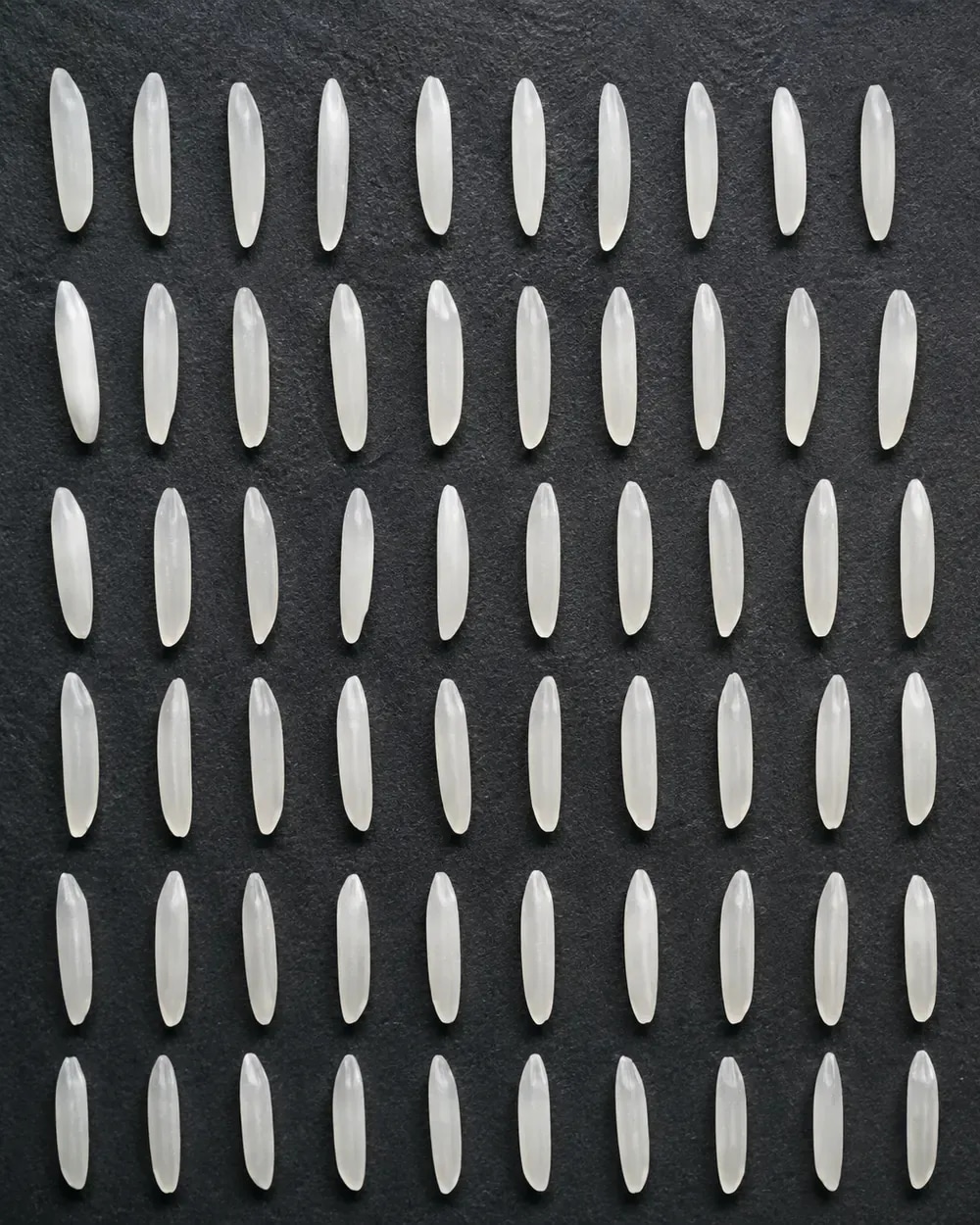 Long rice grains arranged as an accepted reference class.
