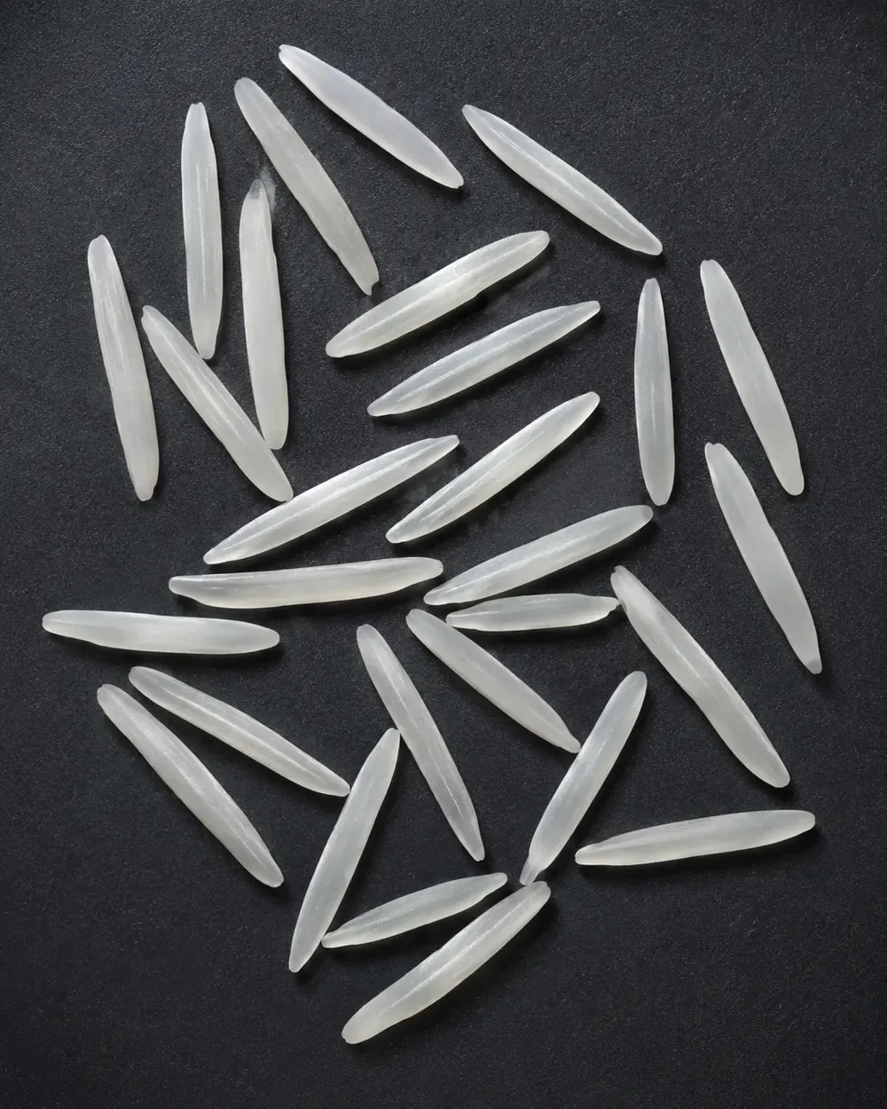 Long rice grains used as an over-length rejection reference.